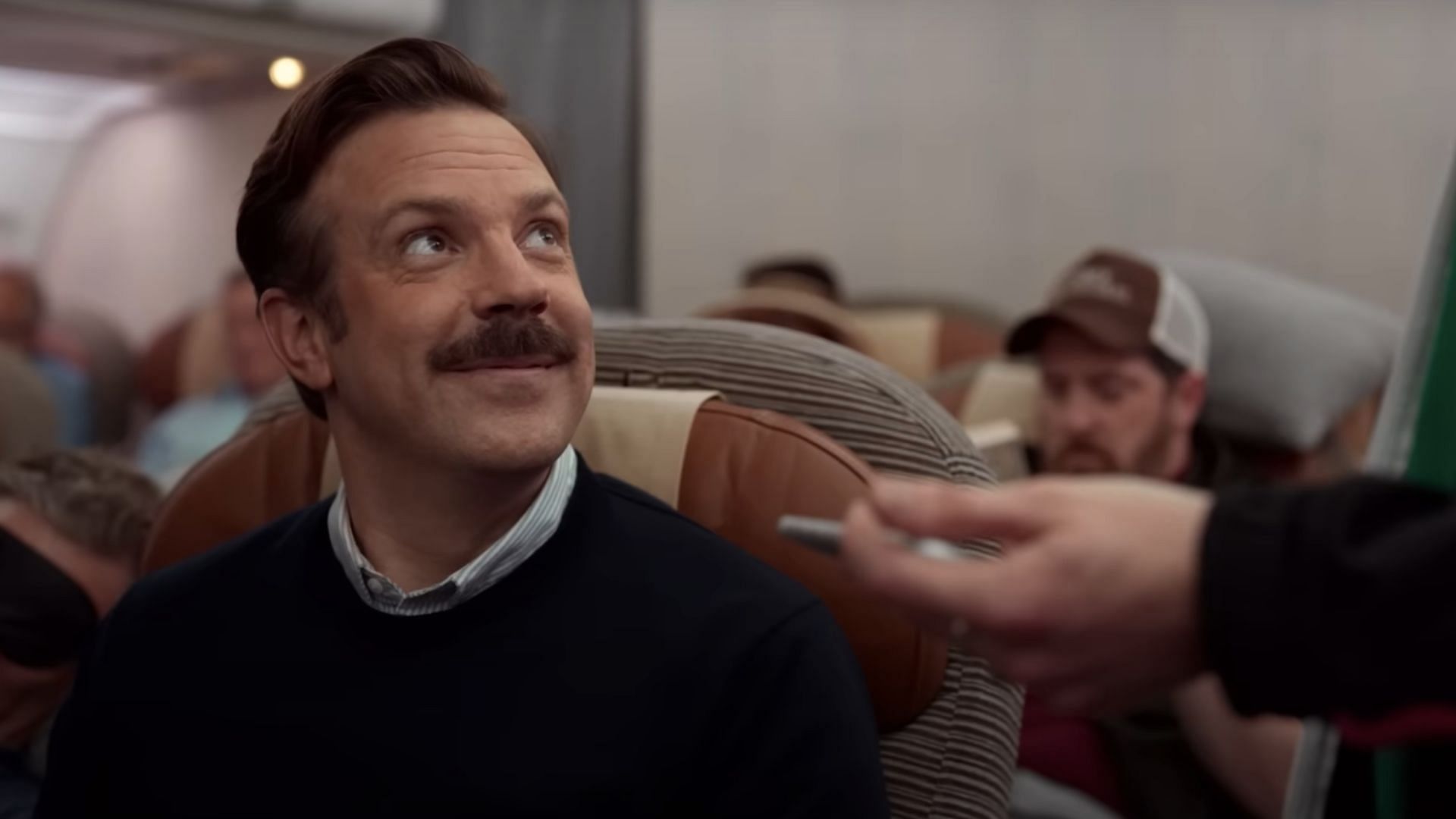Ted Lasso leaves for England (Image via YouTube/Apple TV)